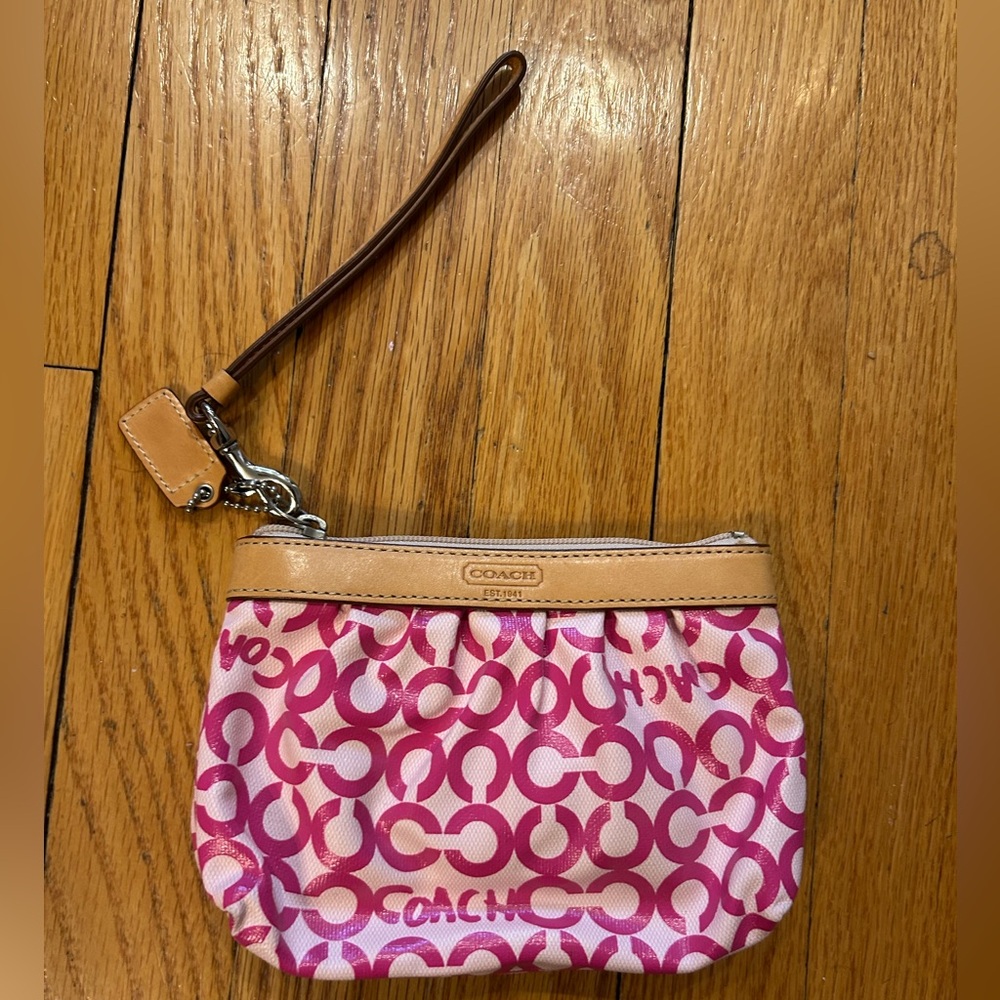 Coach pink opt out wristlet good condition